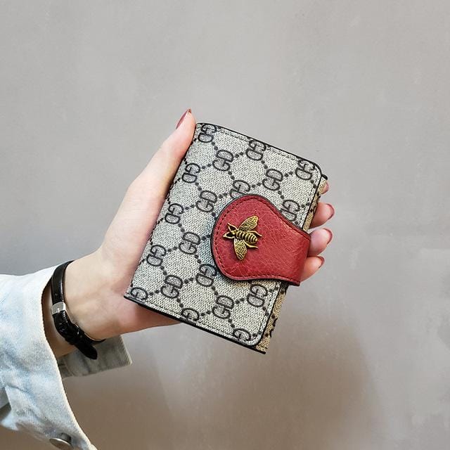 Women's wallet Leather Small bee Luxury Brand Famous Mini Wallets Solid Purses Short Female Coin Purse Credit Card Holder 688