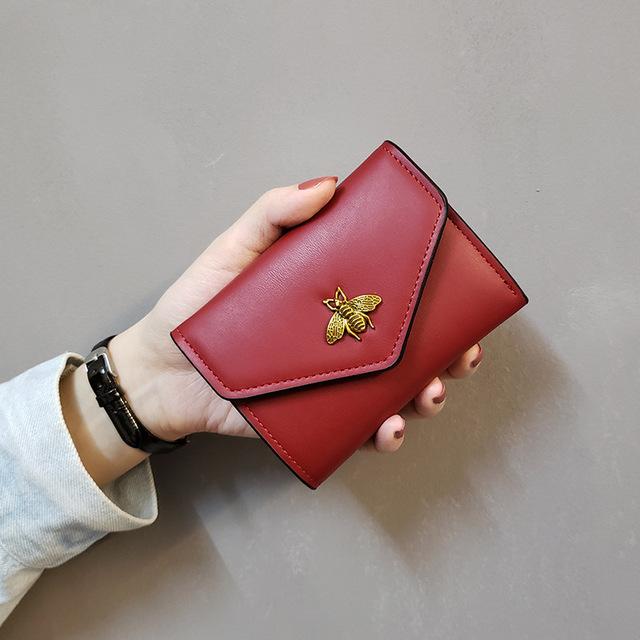 Women's wallet Leather Small bee Luxury Brand Famous Mini Wallets Solid Purses Short Female Coin Purse Credit Card Holder 688